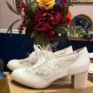 Elegant White Oxford Heels with Broguing